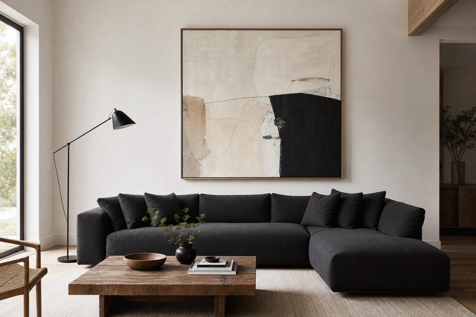 Living room wall with large scale abstract print above sofa