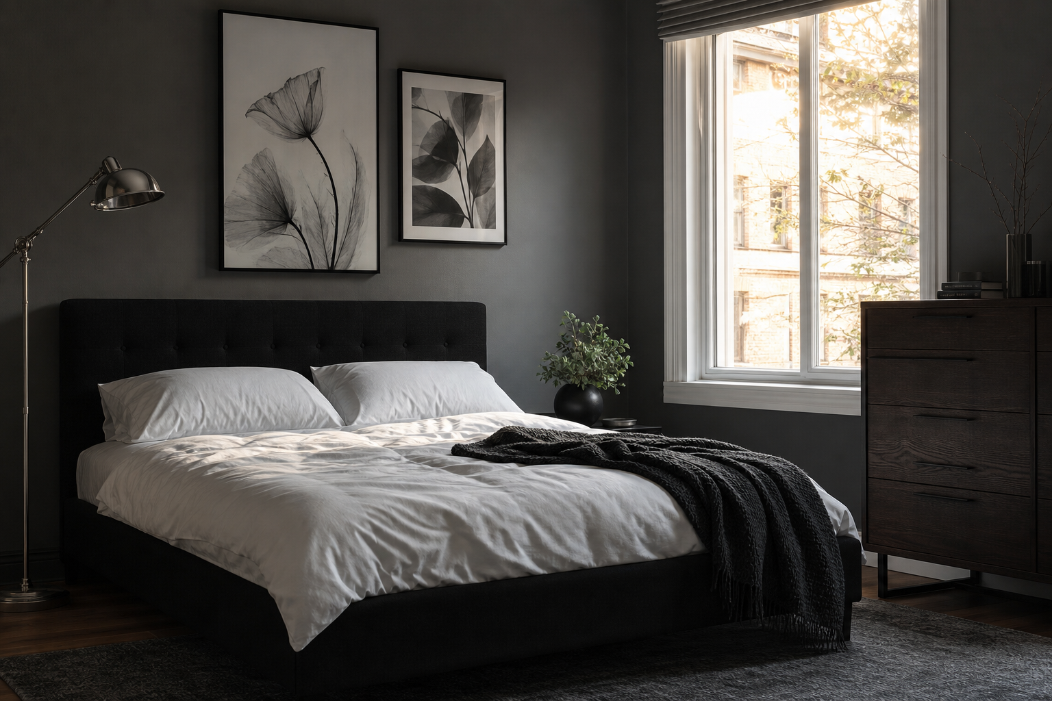 Monochrome anime wall art in a dark bedroom