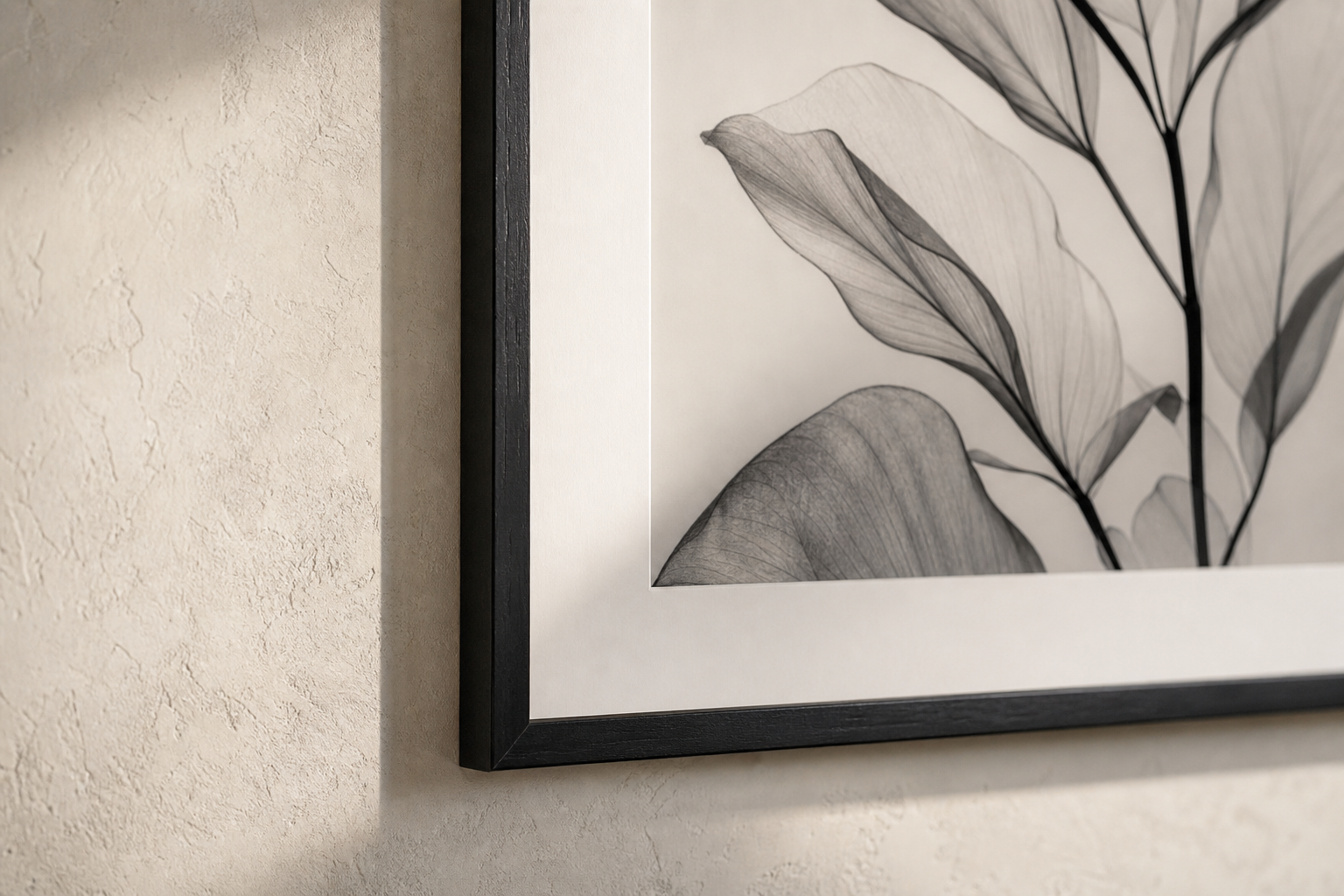 Close-up of black frame and matte paper
