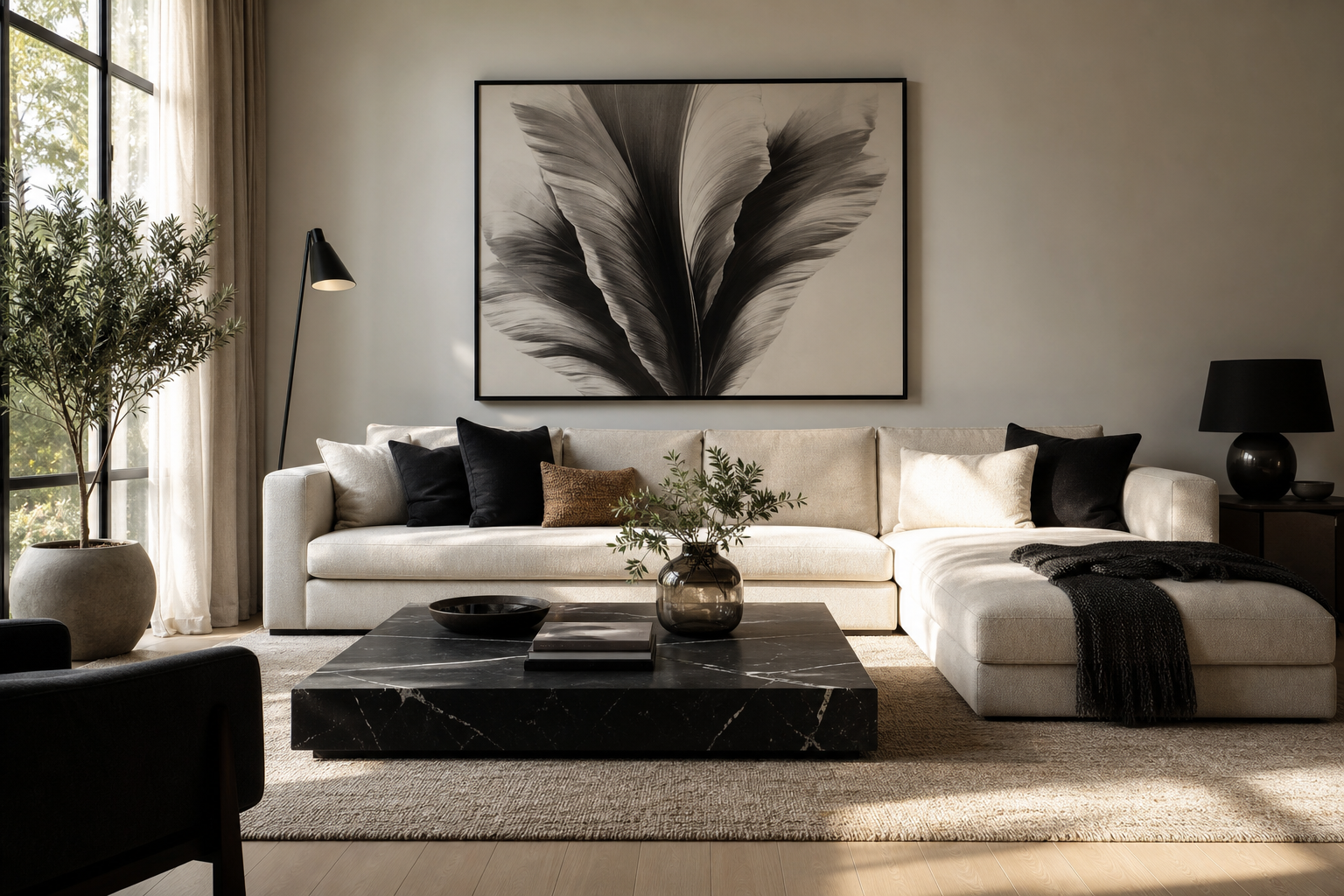 Monochrome living room with dramatic wing-inspired wall art