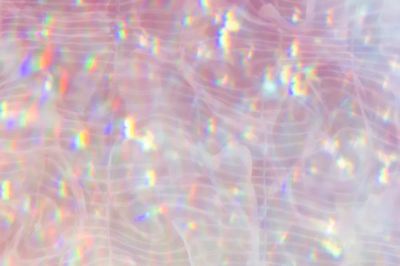 Sparkly pink holographic textured background. poster