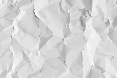 White crumpled paper textured background