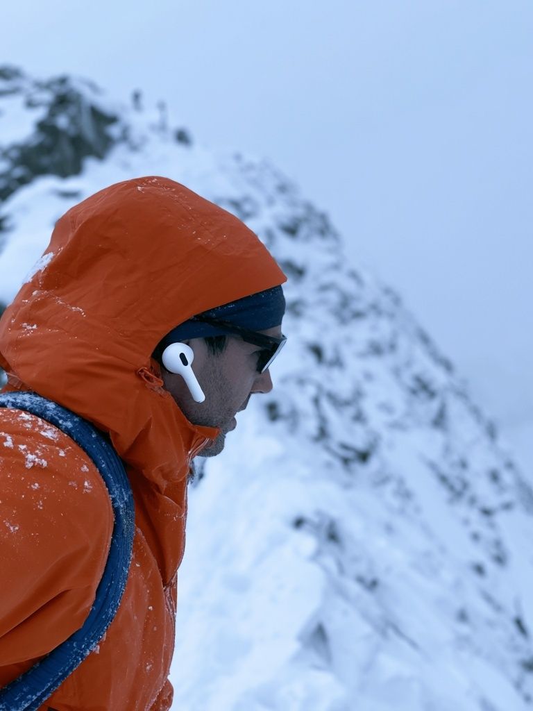 Alpine Climber in Orange Jacket Poster. poster detail
