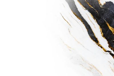 White marble rock textured background.