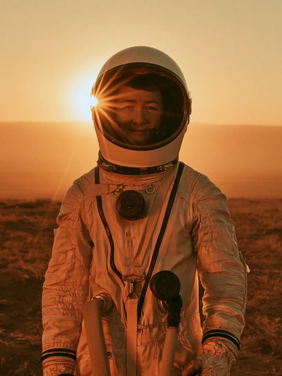 Astronaut at Sunset Photography Poster. poster