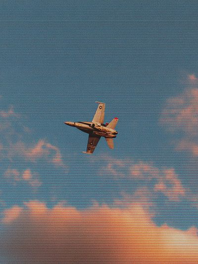 Jet Fighter in Sunset Sky Poster. poster