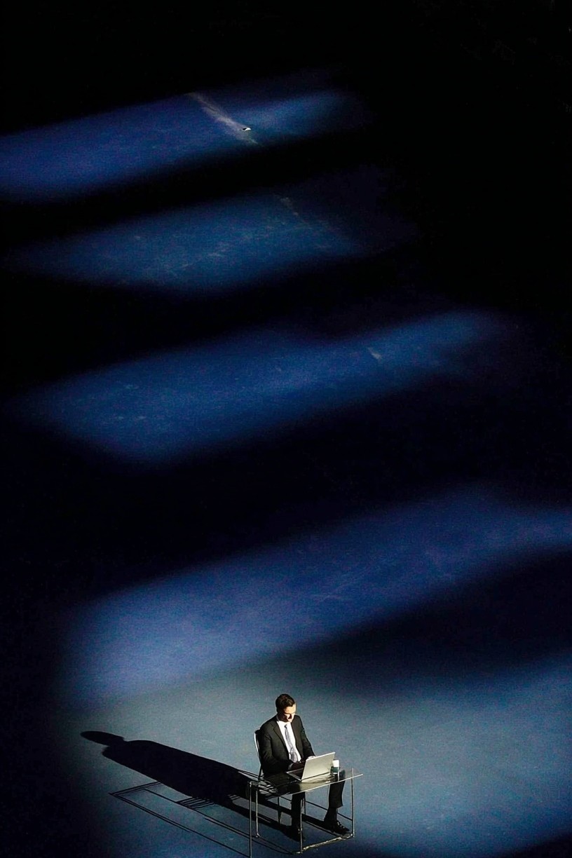 Businessman in Spotlight — Photography Print. poster detail