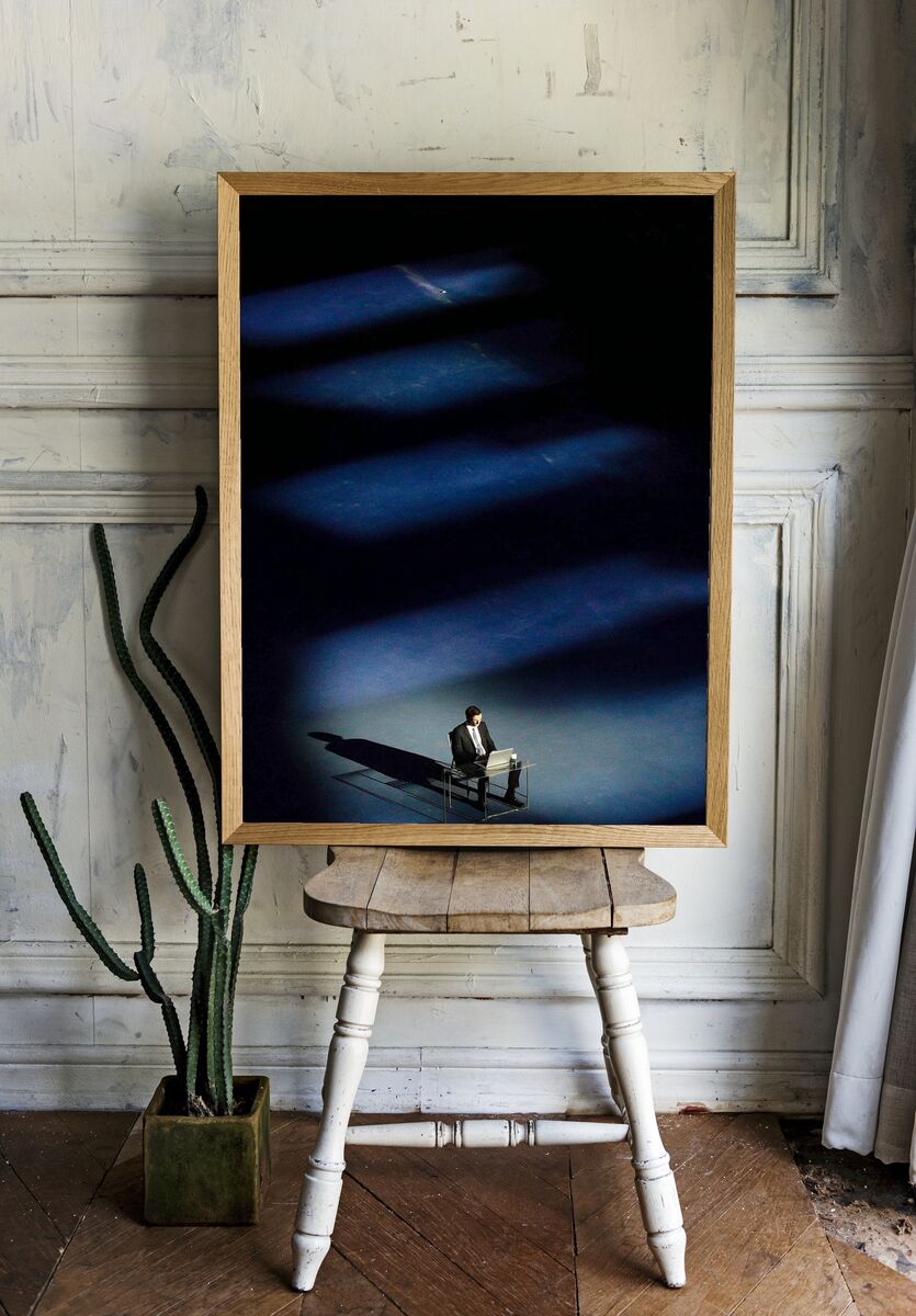 Businessman in Spotlight — Photography Print. — room view 1