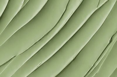 Matcha frosting texture background close-up.