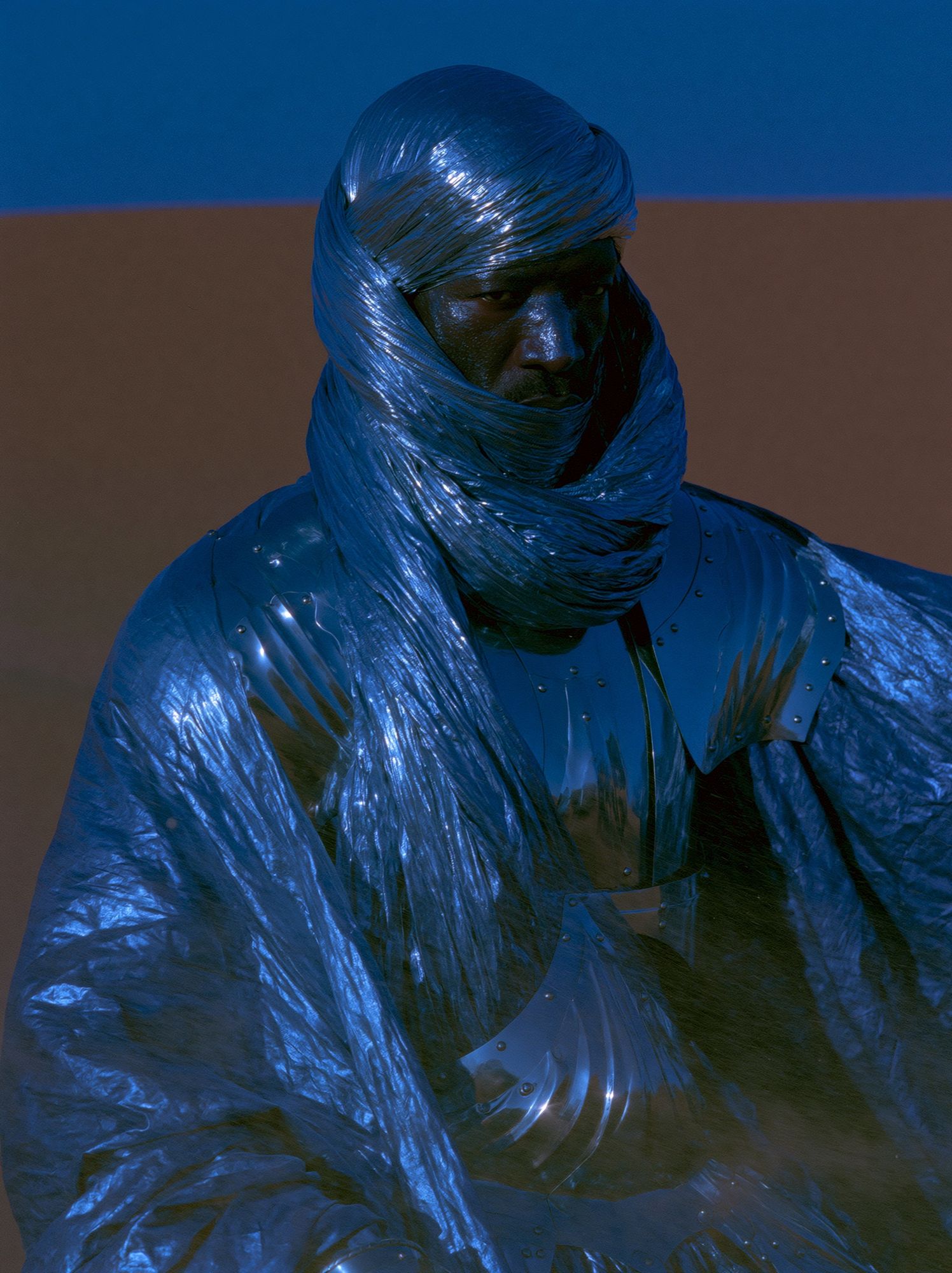 Blue Wrapped Figure Photography Poster. poster detail