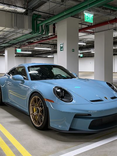Blue Porsche 911 Parking Garage Poster.