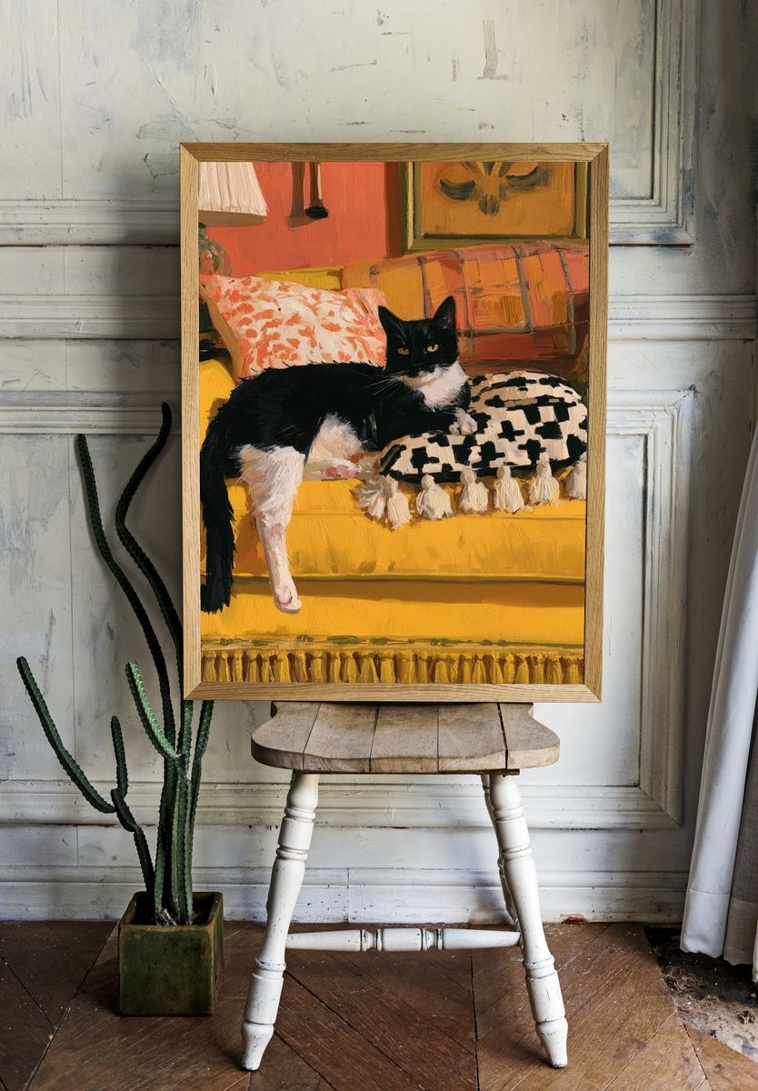 Black and White Cat on Yellow Sofa Poster. room preview