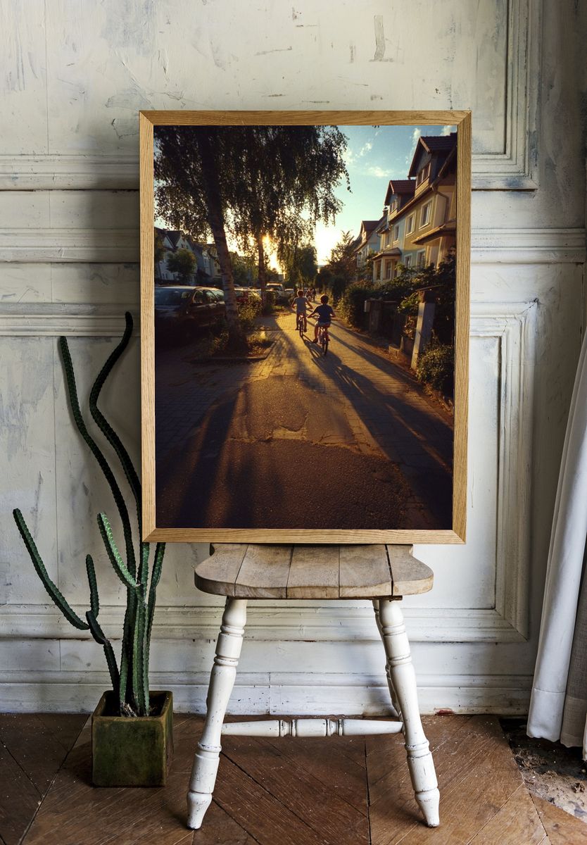 Children Riding Bikes at Sunset Poster. — room view 1