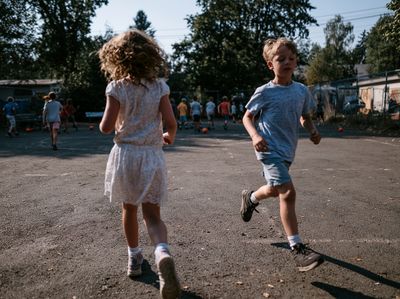 Children Playing Outdoors Photography Poster. poster