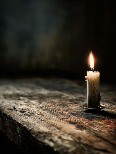 Candlelight on Rustic Table — Photography Print. poster