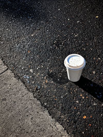 Coffee Cup on Asphalt — Photography Print. poster