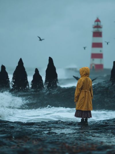 Child in Yellow Raincoat — Coastal Photography Print. poster print