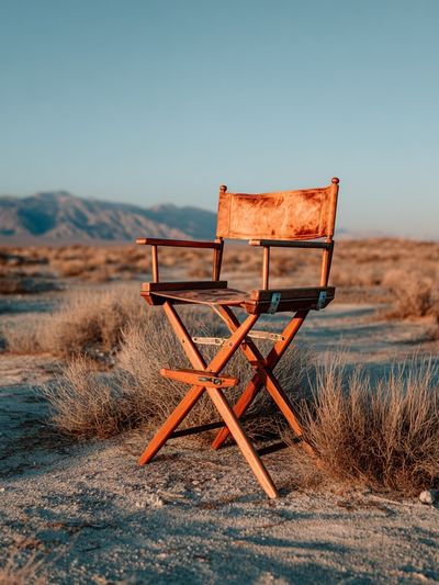 Director's Chair in Desert Landscape Poster. poster print