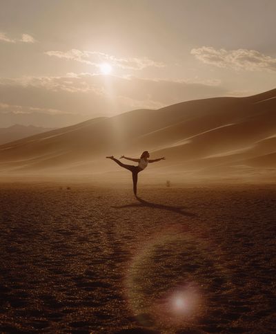 Dancer in Desert Sunset Poster. poster print