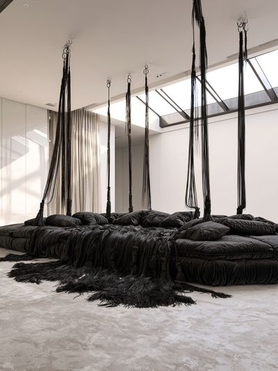 Suspended Black Textile Installation Print.