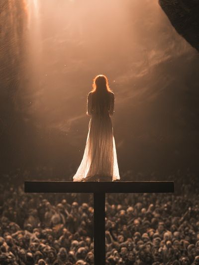 Solitary Figure in Light Poster.