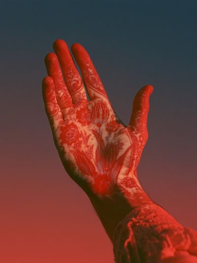 Tattooed Hand in Red Glow Poster.