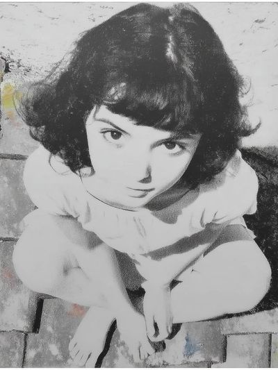 Girl on Cobblestones Fine-Art Print. poster