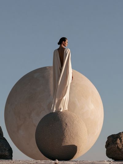 Surreal Figure on Sphere Print.