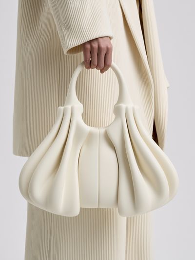 Cream Sculptural Handbag Fashion Poster.