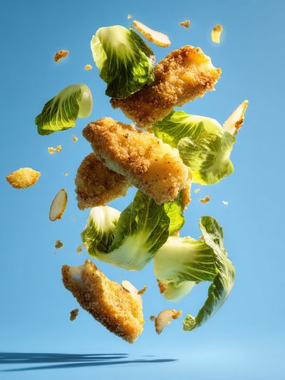 Floating Crispy Chicken Salad Poster.