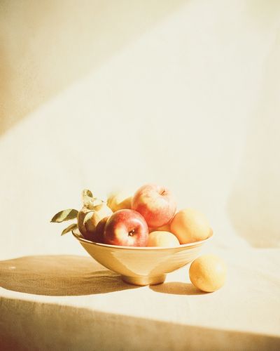 Sunlit Fruit Bowl Still Life Print. poster