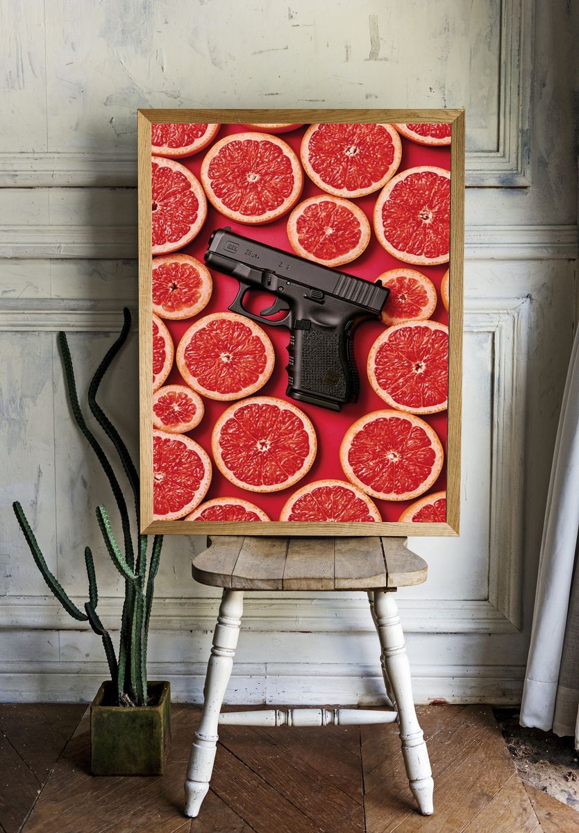 Grapefruit and Pistol Surreal Print. room preview