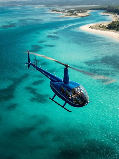 Helicopter Over Turquoise Coast Poster.