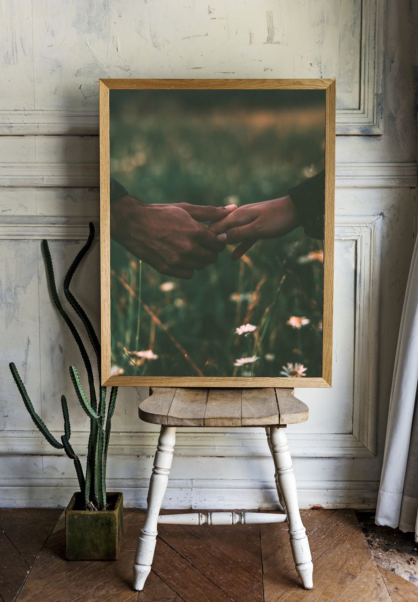 Hands in Meadow Photography Poster. — room view 1
