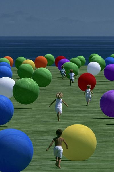 Surreal Children and Spheres Print.