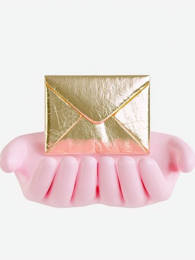 Golden Envelope in Pink Hands Poster.