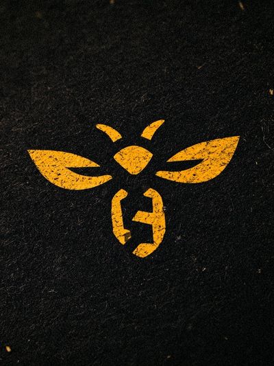 Yellow Bee Emblem Typography Poster.