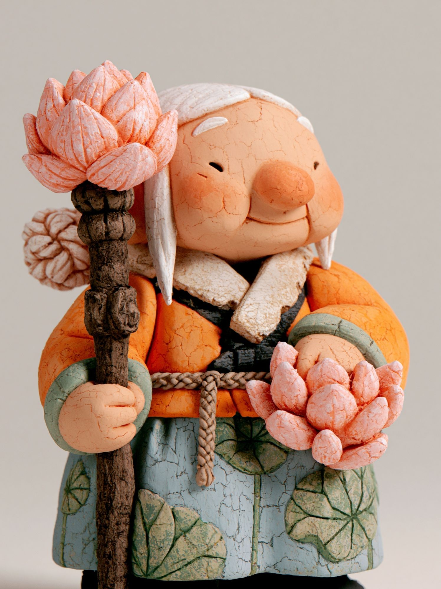 Ceramic Elder with Lotus Staff Poster. poster detail