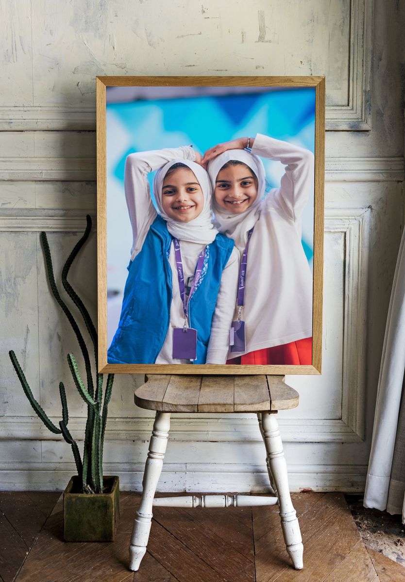 Smiling Girls at Event — Photography Print. — room view 1