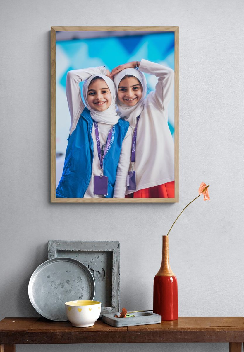 Smiling Girls at Event — Photography Print. — room view 3