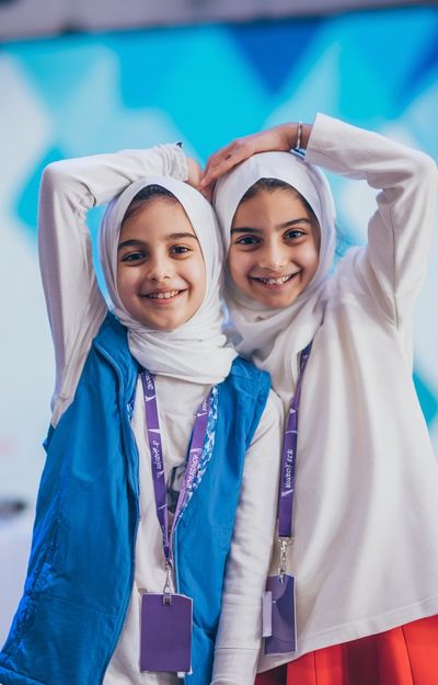 Smiling Girls at Event — Photography Print. poster
