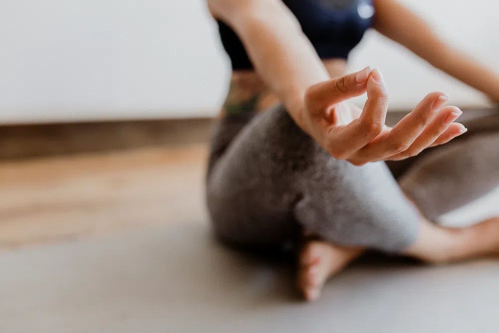 Fitness woman Padmasana pose. poster detail