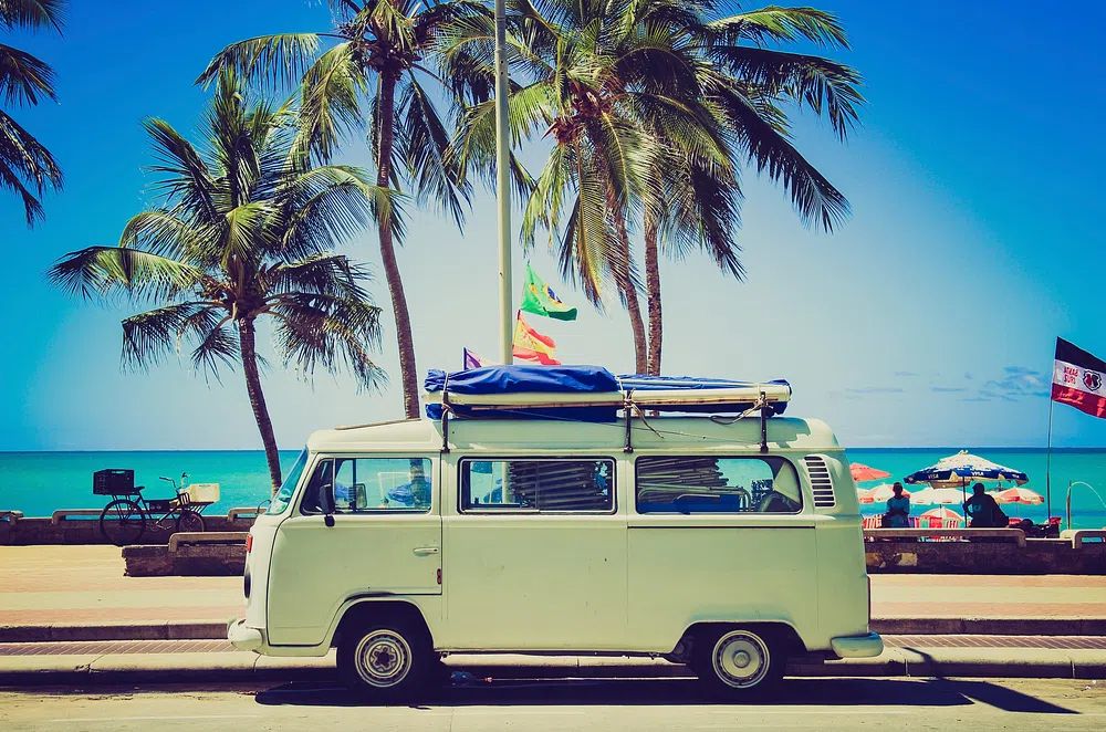 Classic caravan parked front beach. poster — maps-travel art