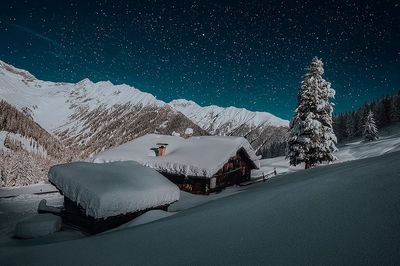 Snowy Mountain Cabin Night Poster. poster