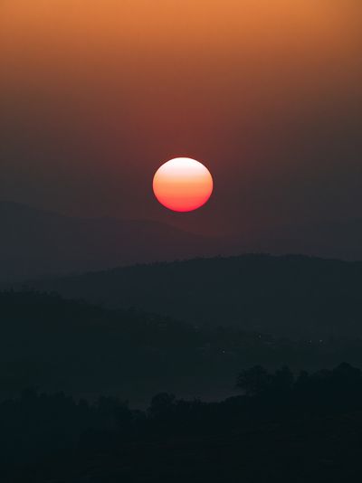Sunset Over Misty Hills Print.