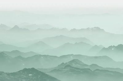 Green mountains background, misty landscape. poster