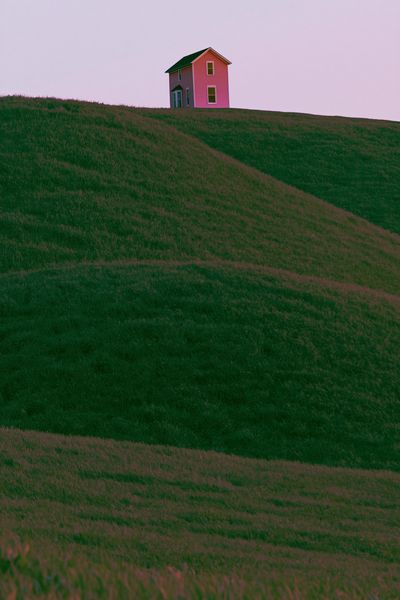 Pink House on Green Hills Poster. poster