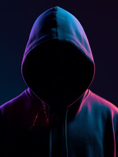 Neon Hooded Figure Photography Poster. poster