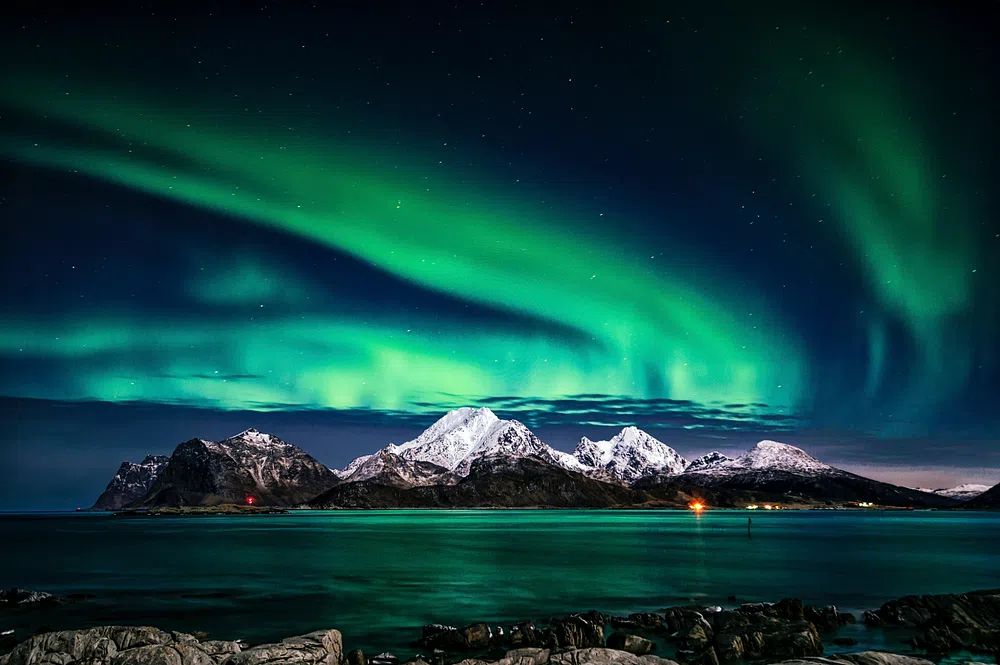 Northern Lights Over Snowy Mountains — Photography Print. poster detail