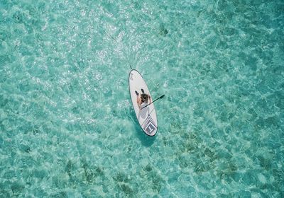 Paddleboarding in Crystal Clear Waters — Photography Print. poster print